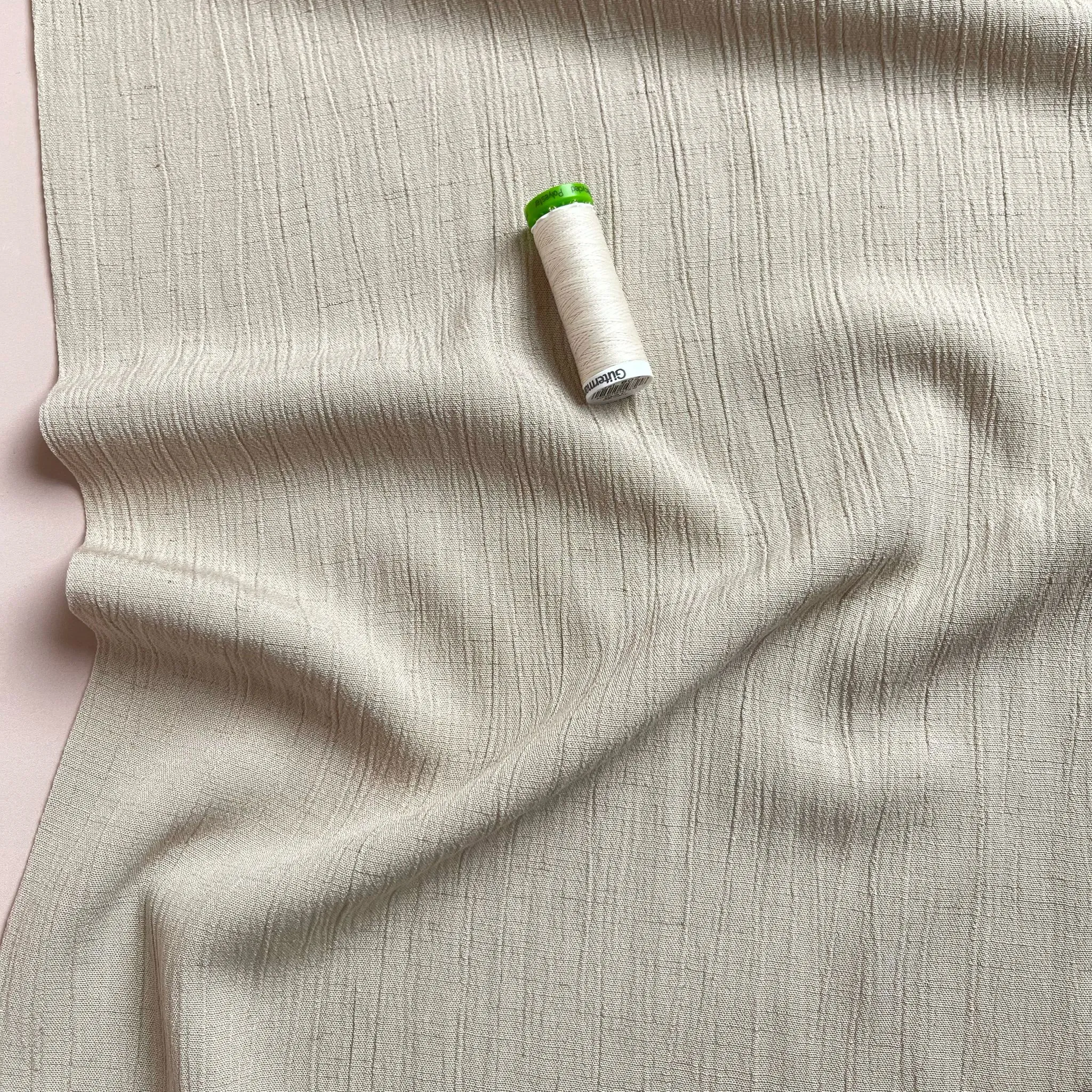 REMNANT 0.88 Metre - Crinkle Viscose Linen Blend Fabric in Ecru Beige